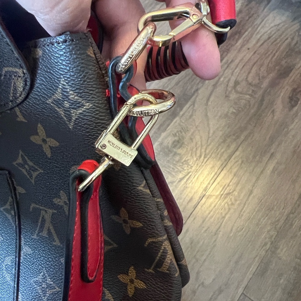 Louis Vuitton Monogram Bag with Vibrant Red Tags